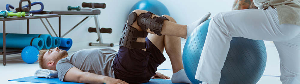 person in rehab for knee